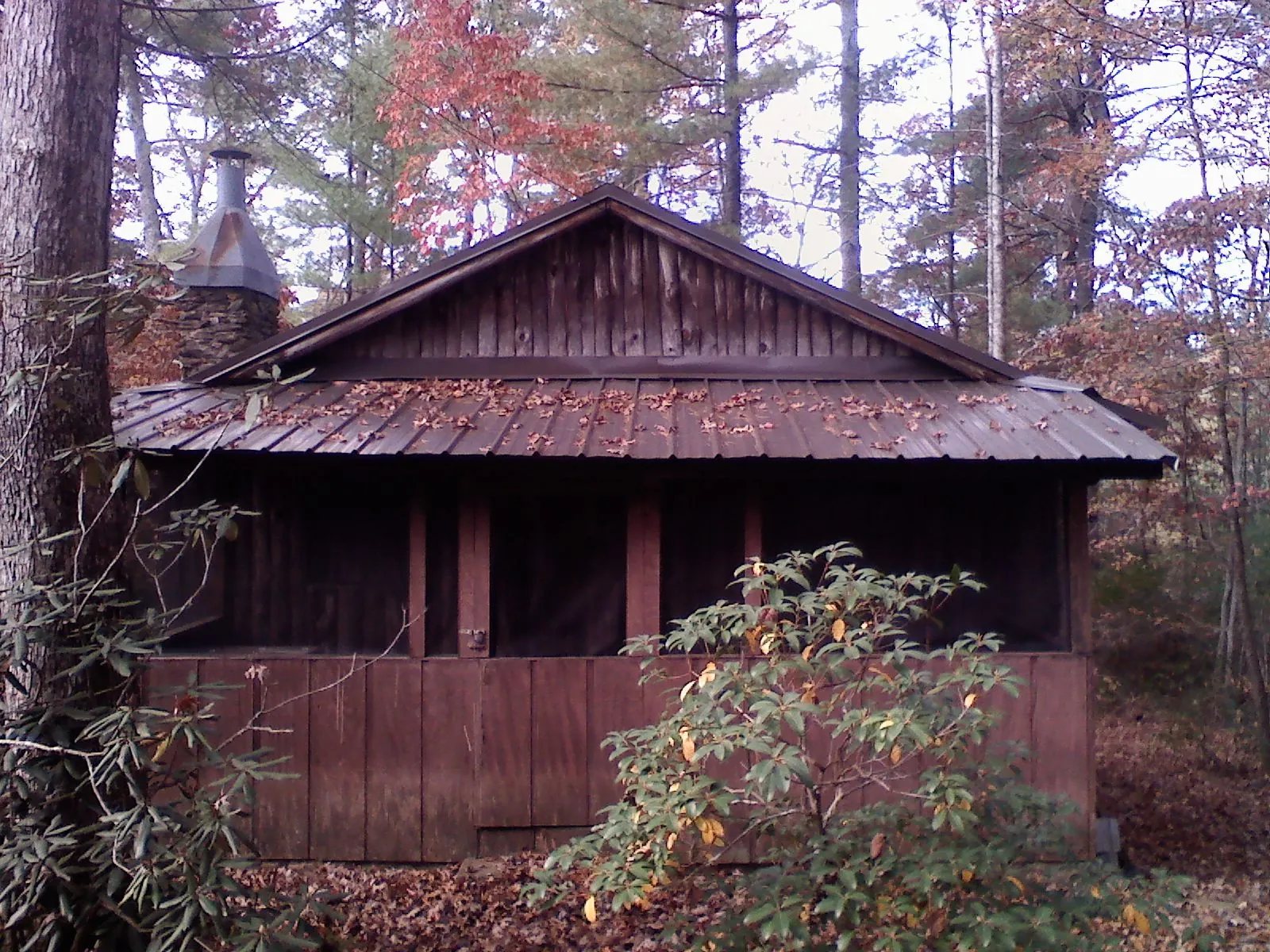 Metal roof over the screened porch of a rustic cabin in Ibapah